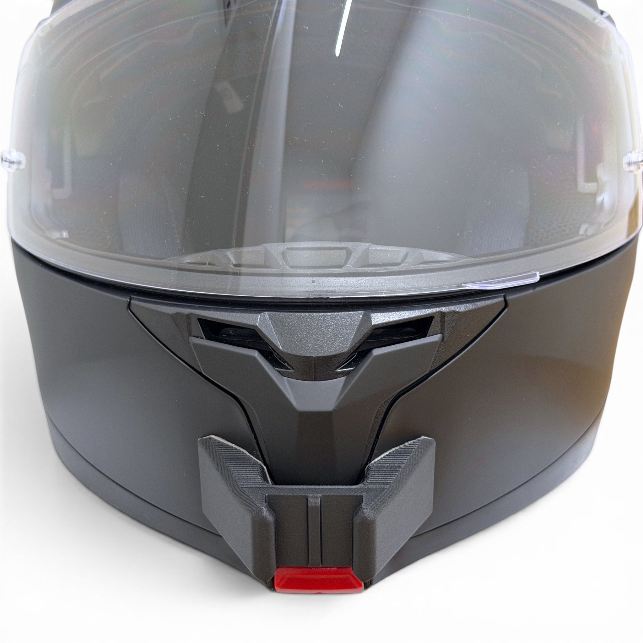 Vista frontal del casco HJC C91N con el soporte de mentonera RiderMounts montado
