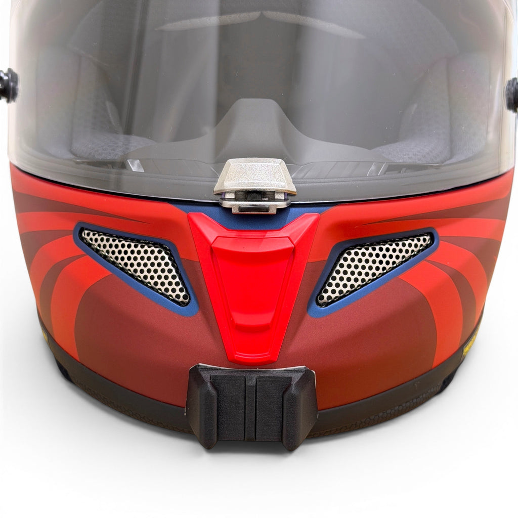 Vista frontal del casco HJC RPHA 11 con el soporte de mentonera RiderMounts montado