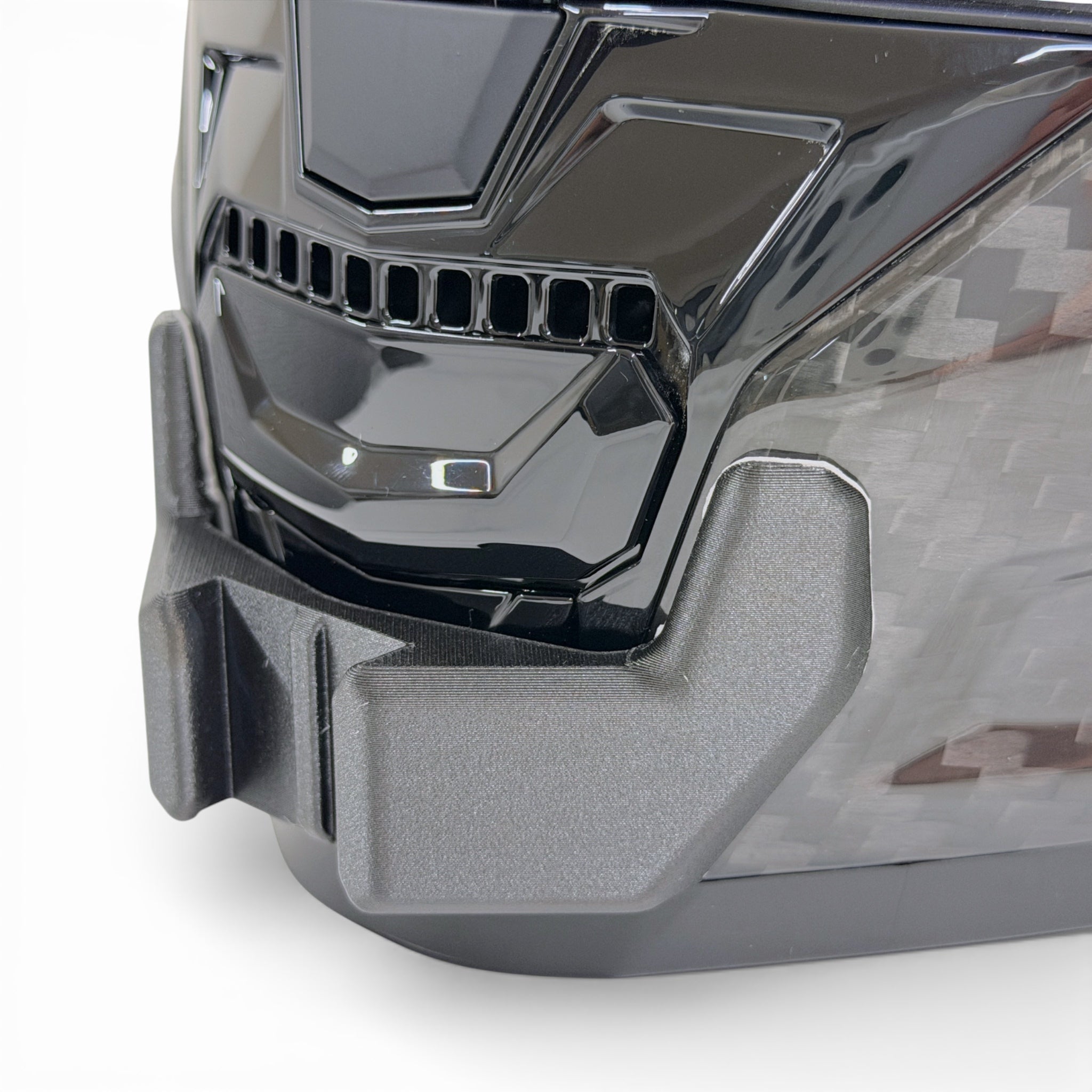 Primer plano del soporte de mentonera RiderMounts en la barbilla del casco LS2 VECTOR 2 FF811